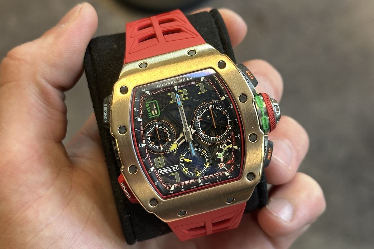 Richard Mille RM 65-01 in rose gold on a red strap